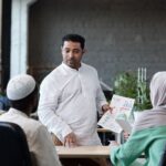 Confident Businessman With Financial Paper Looking ZWVQ27J 1 150x150