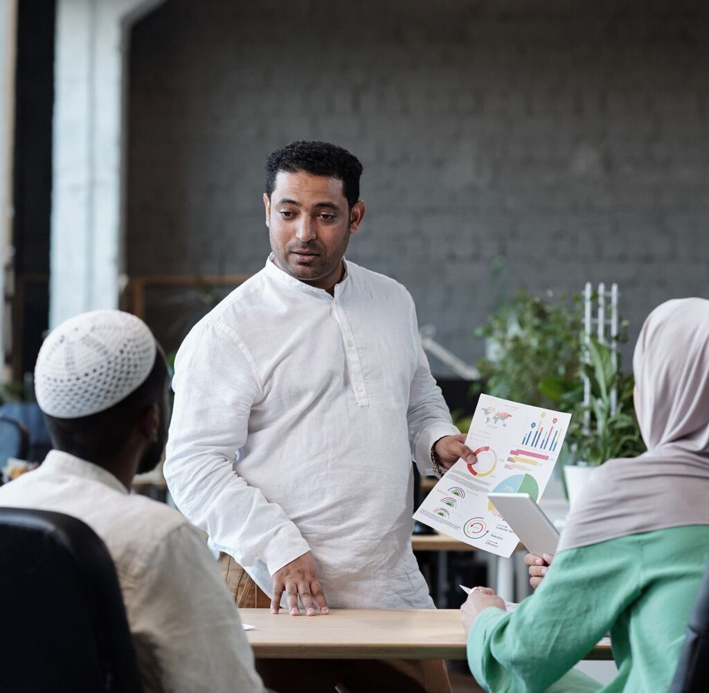 Confident Businessman With Financial Paper Looking ZWVQ27J 2 1024x1001