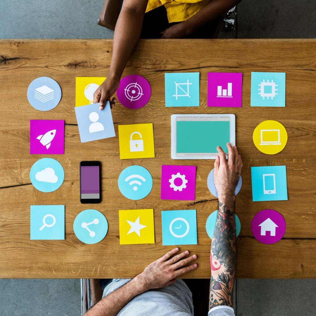 Group Of Computer Icon On The Wooden Table P77YUSB 1 1024x1024